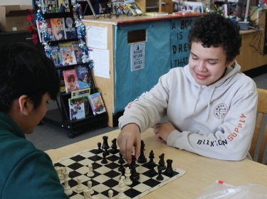 Students playing chess